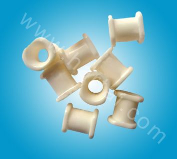 Double section ceramic eyelet